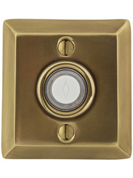 Doorbell Button with Quincy Rosette in Antique Brass.